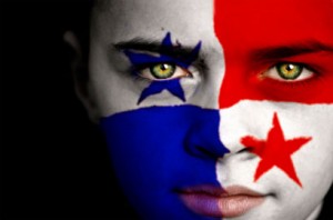 Portrait of a boy with the flag of Panama on his face