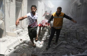 Syrian men carry a body on a stretcher amid the rubble of destroyed buildings following a reported air strike on the rebel-held neighbourhood of Al-Qatarji in the northern Syrian city of Aleppo  on April 29  2016  Fresh bombardment shook Syria s second city Aleppo  severely damaging a local clinic as outrage grows over an earlier air strike that destroyed a hospital  The northern city has been battered by a week of air strikes  rocket fire  and shelling  leaving more than 200 civilians dead across the metropolis  The renewed violence has all but collapsed a fragile ceasefire deal that had brought an unprecedented lull in fighting since February 27     AFP PHOTO   AMEER ALHALBI